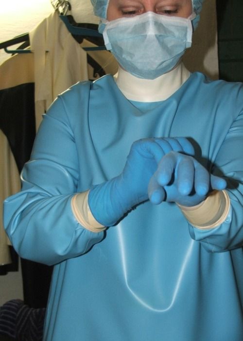 Nurse stretches slave urethra with