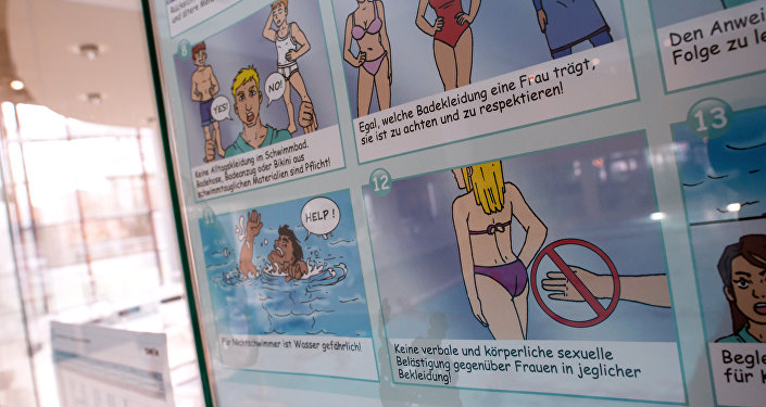 a poster informs about pool rules in a public swimming pool in munich southern germany