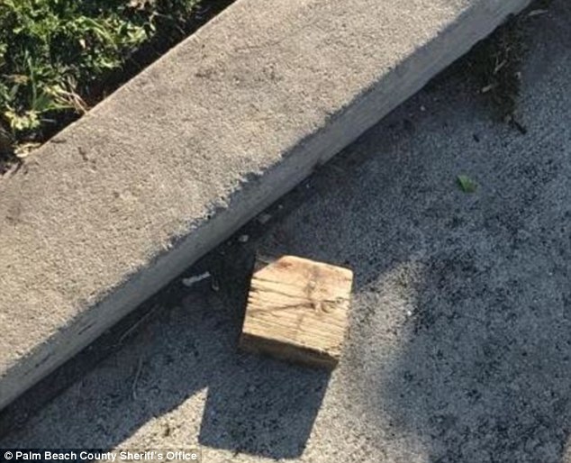 a vehicle in president donald trumps motorcade was struck a wooden block