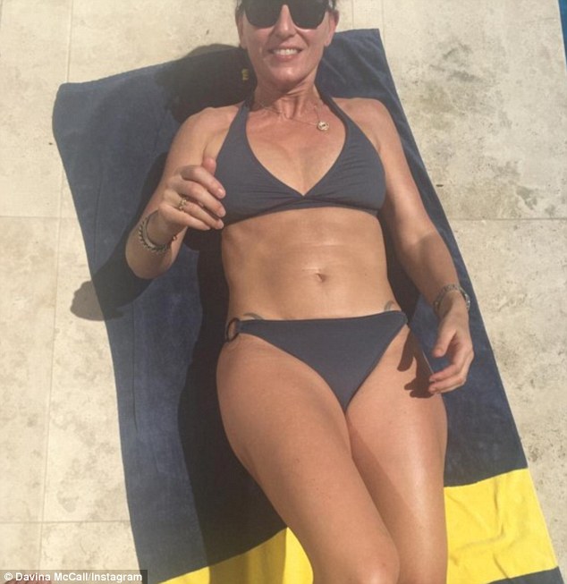 alright for some davina mccall induced a fresh bout of ab envy as she flaunted