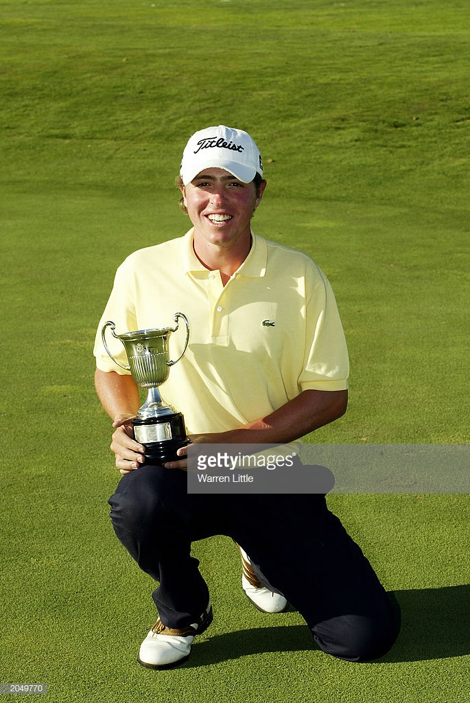 amateur pablo martin of spain poses with the trophy for top amateur picture