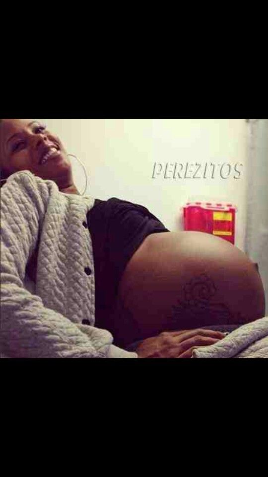 americas next top model eva marcille shows off tattooed baby bump