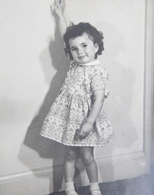 angela levin aged three wearing the dress she left home in as a child