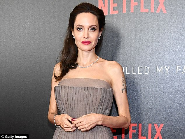 angelina jolie above in september said that she never worked with weinstein again after