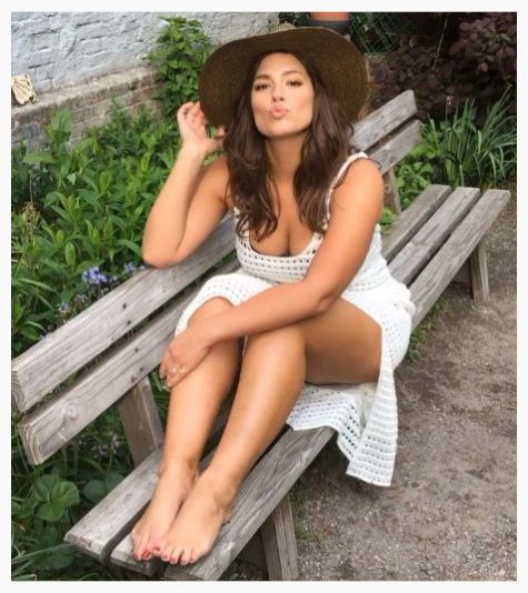 ashley graham turning up the heat in the summer in white cover up beach dress showing off her sexy feet and legs