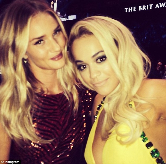 babes together model rosie looked thrilled to be sat next to rip singer rita ora