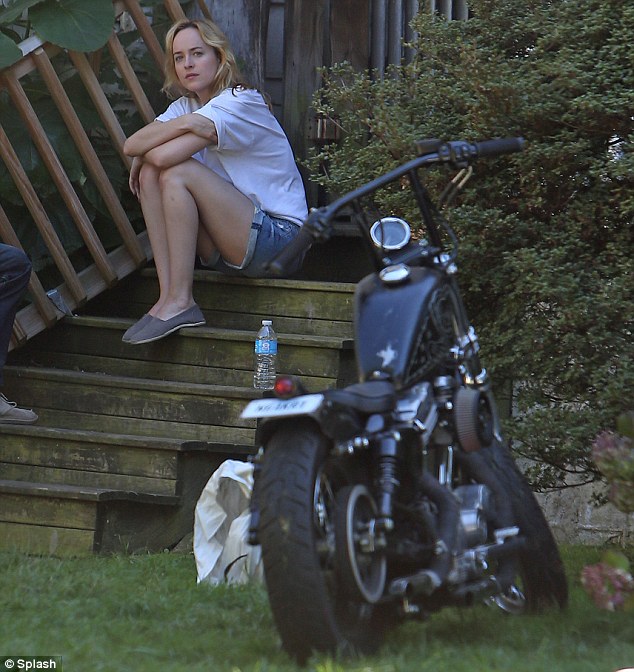 biker babe it appears that dakota also gets to film scenes on a vintage motorcycle