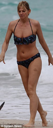 bikini body zoe has been showing off her trim figure on the beach holiday
