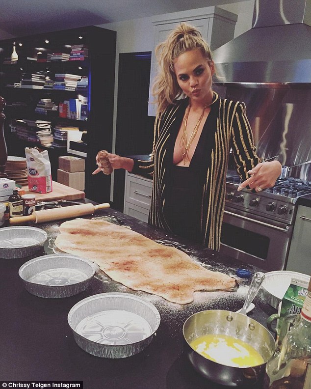 braless chrissy teigen cooks up some sexy fun in the kitchen