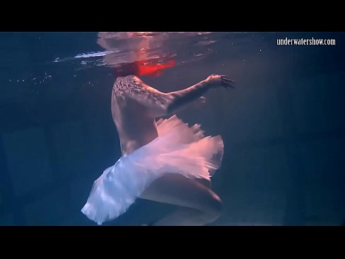 bulava lozhkova with a red tie and skirt underwater