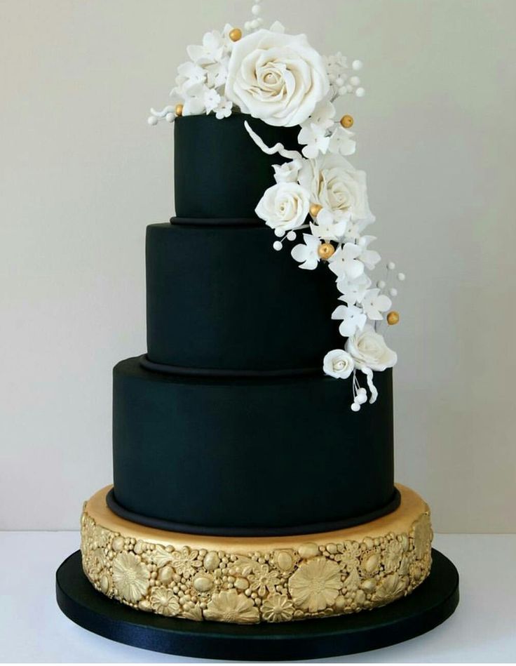 cake laura loukaides black and gold tiered cake just the black with white flowers