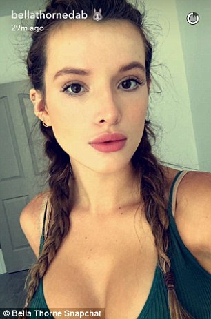 california girl bella soaked up the sun in a green top in a snapchat posted
