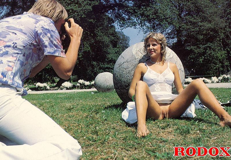 classic blonde porn star horny seventies lady shows her boobies in a public park