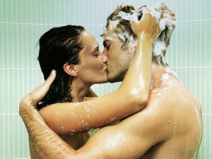 couple kissing in shower woman shampooing mans hair relationships romance love