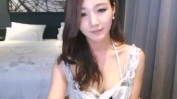 cute and sexy korean cam girl neat shows off her boobs 2