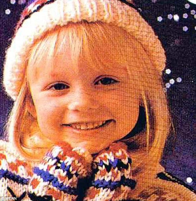 cutie another throwback picture shows an adorable emma all bundled up in a hat