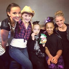 dance moms kendall and nia posing with a trophy dance moms 1