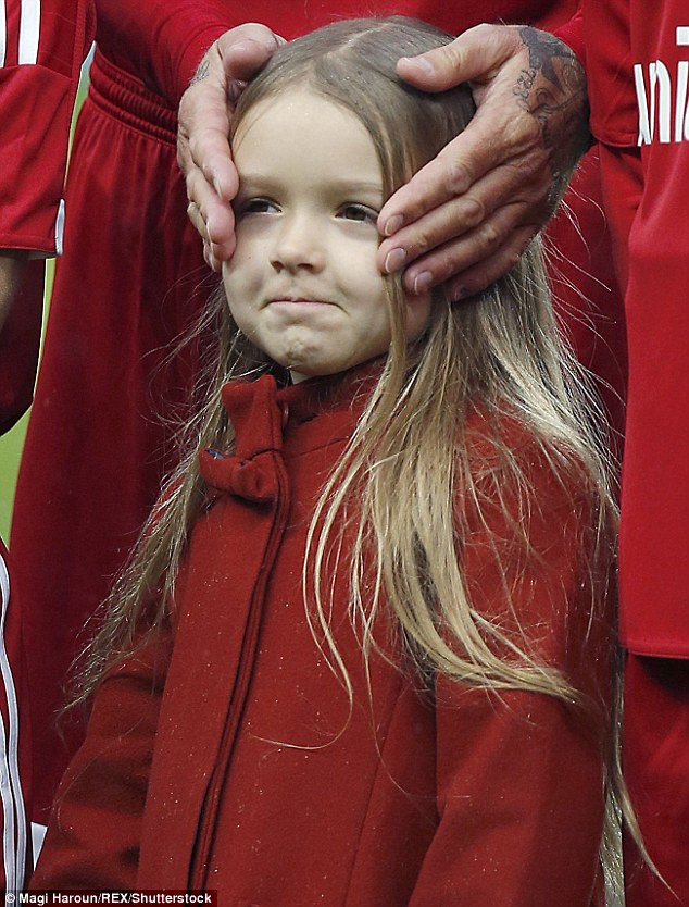 david beckham strokes harpers hair as the beckhams seem to be a physically affectionate family