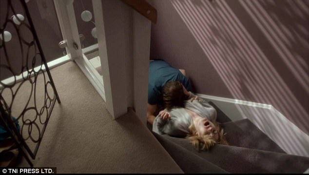 explicit the scenes saw jodie lying on a staircase and throwing back her head
