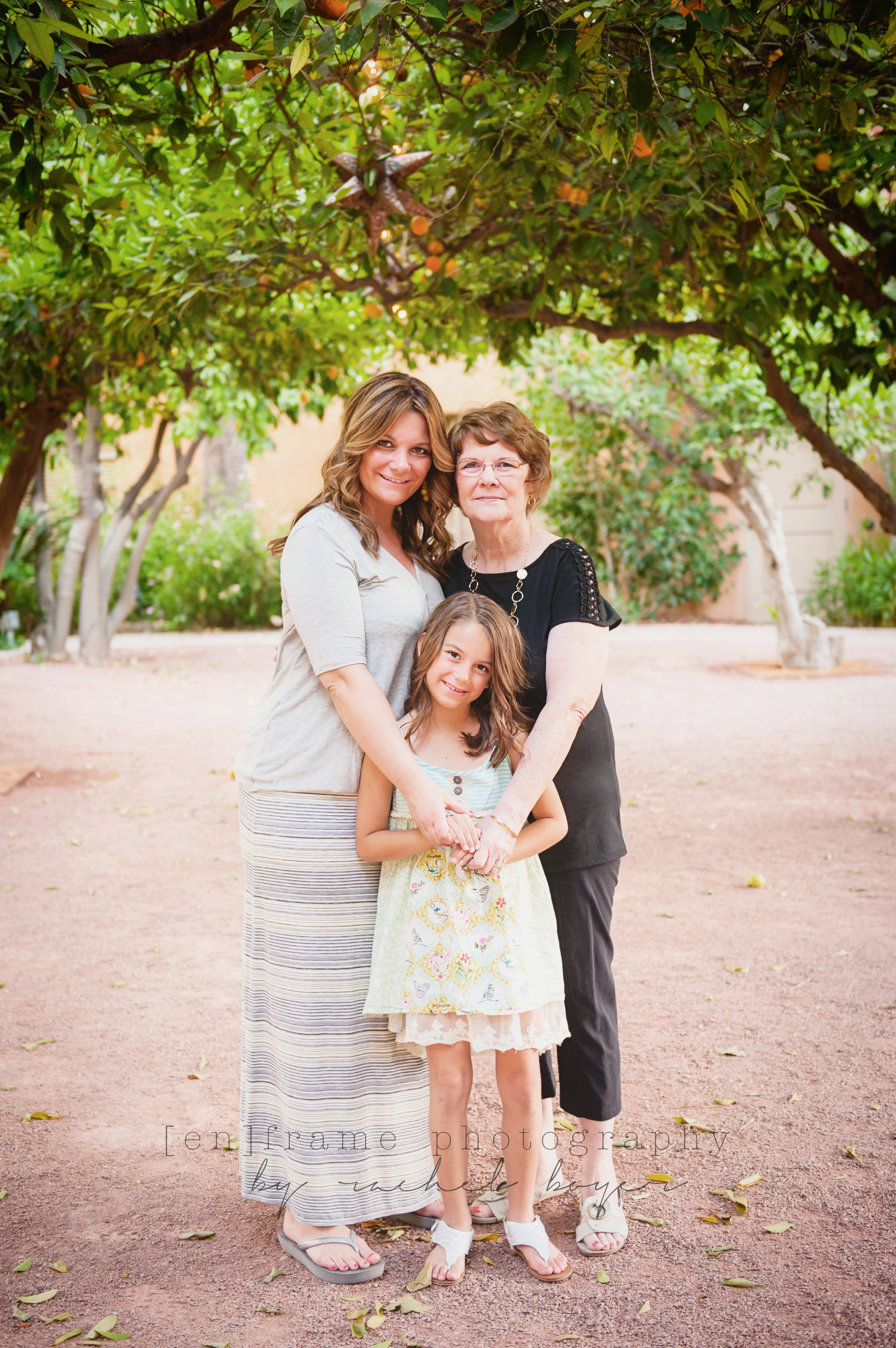 family photo session mother daughter grandmother in orange groves at royal palms phoenix arizona