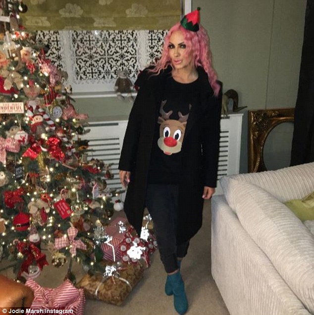 feeling festive the reality star rocked a cute reindeer jumper and elf hat as she