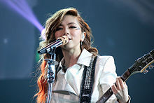 g e performing during the live tour in hong kong january