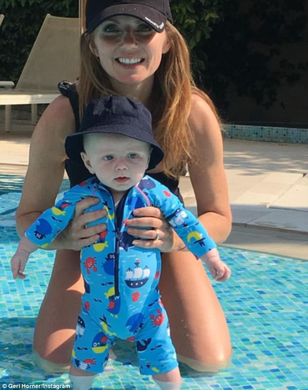 going swimming geri horner looked every inch the doting mother as she shared