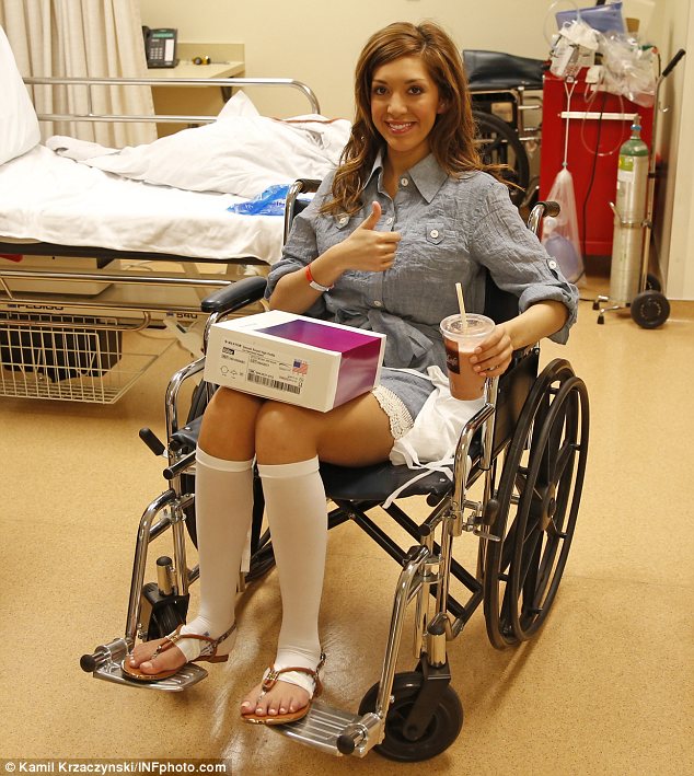 good to go farrah gave cameras the thumbs up after undergoing the surgery and heading