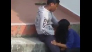 guy getting blowjob a girl in the school