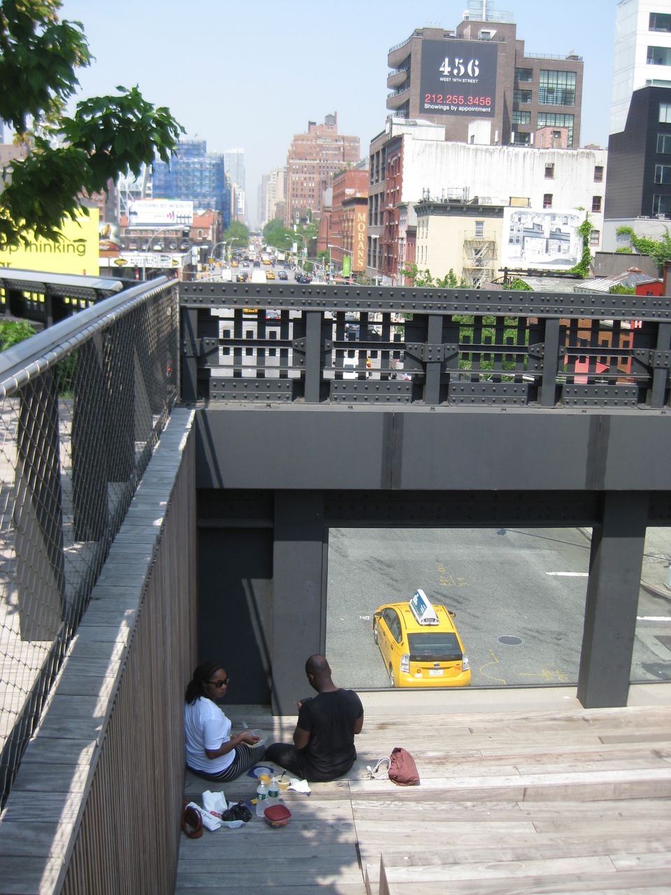 high line park viewing platform looking up avenue at street