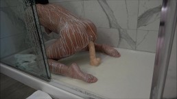 hot amateur takes a creamy shower while riding her inch dildo to orgasm 1