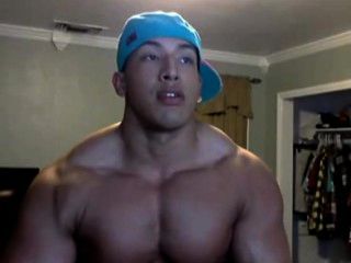 hot asian guy showing off his muscle tmb