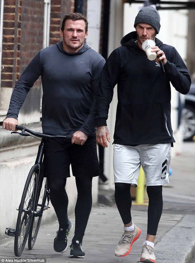 just hanging out personal trainer bobby rich and david beckham stepped out following a gruelling