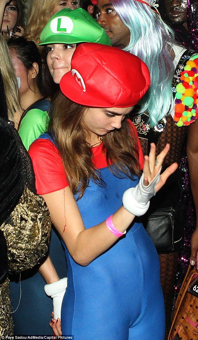 kendall jenner cozies up to cara delevingne at halloween party