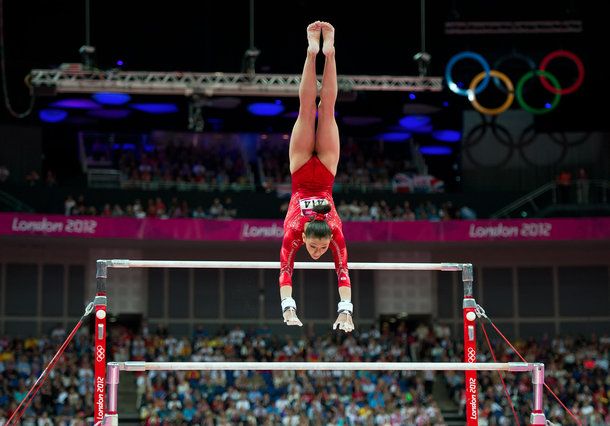 kyla ross of team usa competes on the uneven parallel bars during london olympics womens