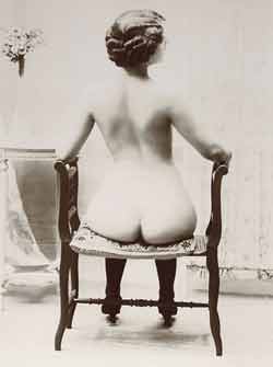 lady sitting on stool showing off her ass