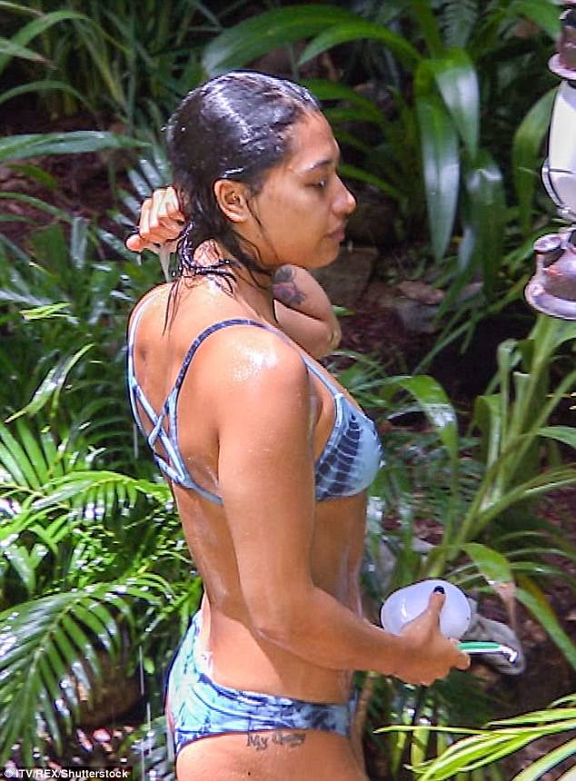 lathering up vanessa white is seen donning a skimpy blue bikini as she enjoys