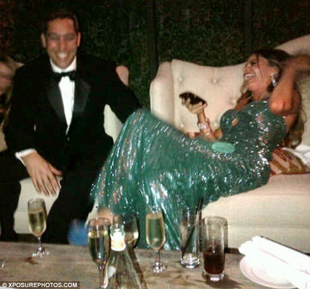 letting her hair down the actress celebrated quaffing champagne with her man