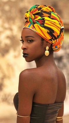 love the color drama and elaborate tie on this african style head wrap
