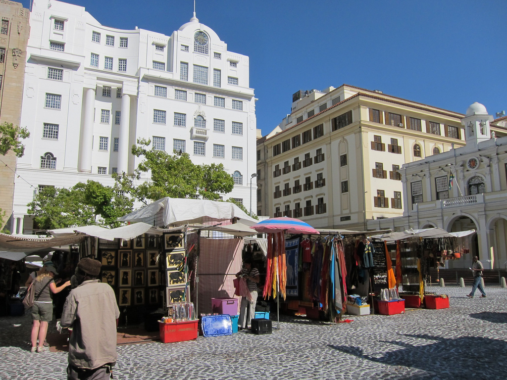 merchants come from all over africa to sell their wares at greenmarket square in the centre