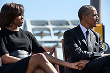 michelle obama and president obama hold hands during an event commemorating the anniversary of bloody sunday