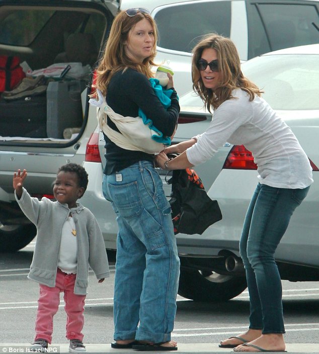 modern family jillian michaels and her partner heidi rhoades with their two year