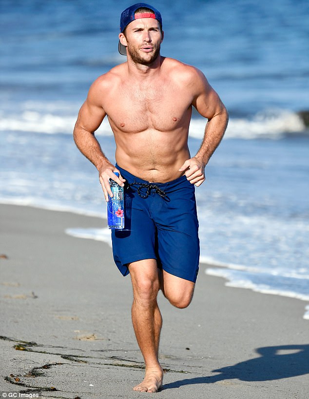 muscle man scott eastwood displayed his generous muscles and cut figure while taking