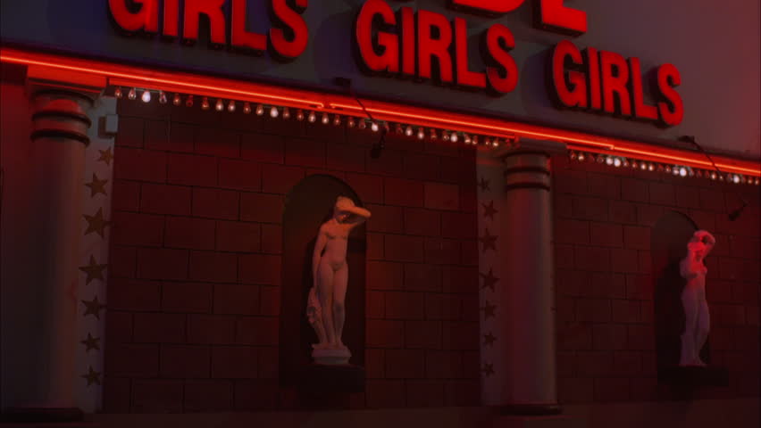 night two greek roman style nude women statues pedestals brick 1