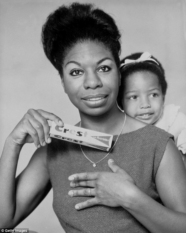 not all smiles jazz singer songwriter and pianist nina simone poses with daughter lisa
