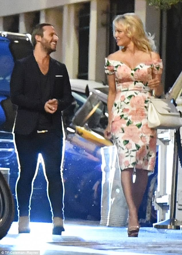 pamela anderson heads out with footballer adil rami daily mail