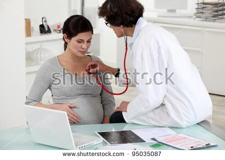 pregnant woman doctors surgery stock photo shutterstock