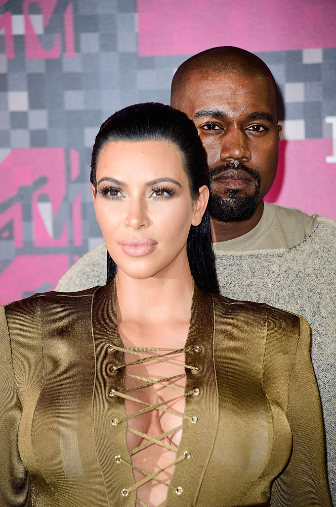 recording artist kanye west and personality kim kardashian attend the mtv