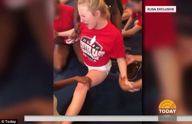 shocking video has emerged showing colorado high school cheerleaders being forced into painful splits as they