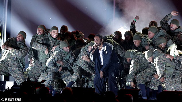 show of strength the rapper was backed up a phalanx of military garbed